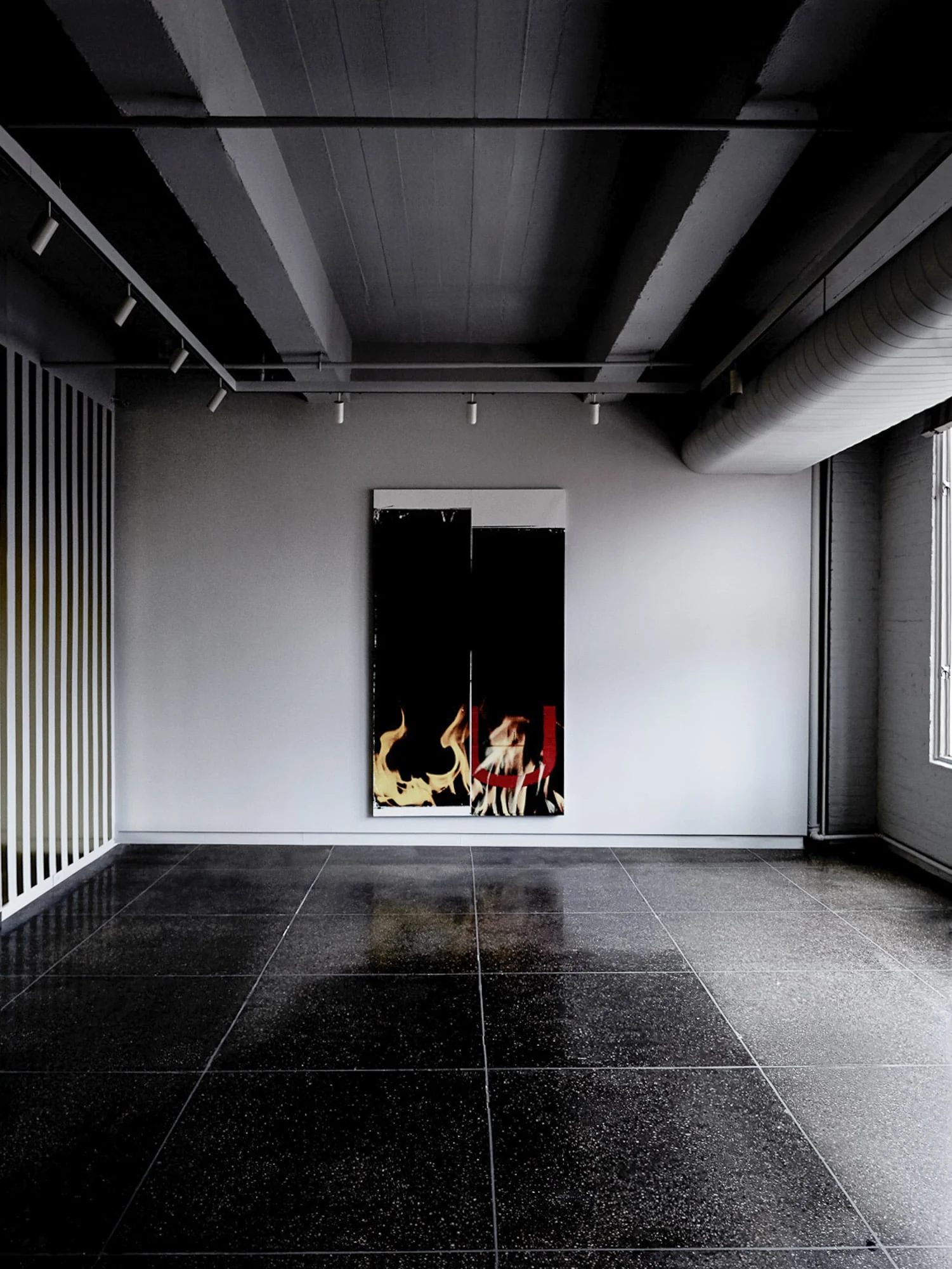 Large black painting with flames hung in a grey gallery with dark polished tile floor and track lights, for Viana Art.