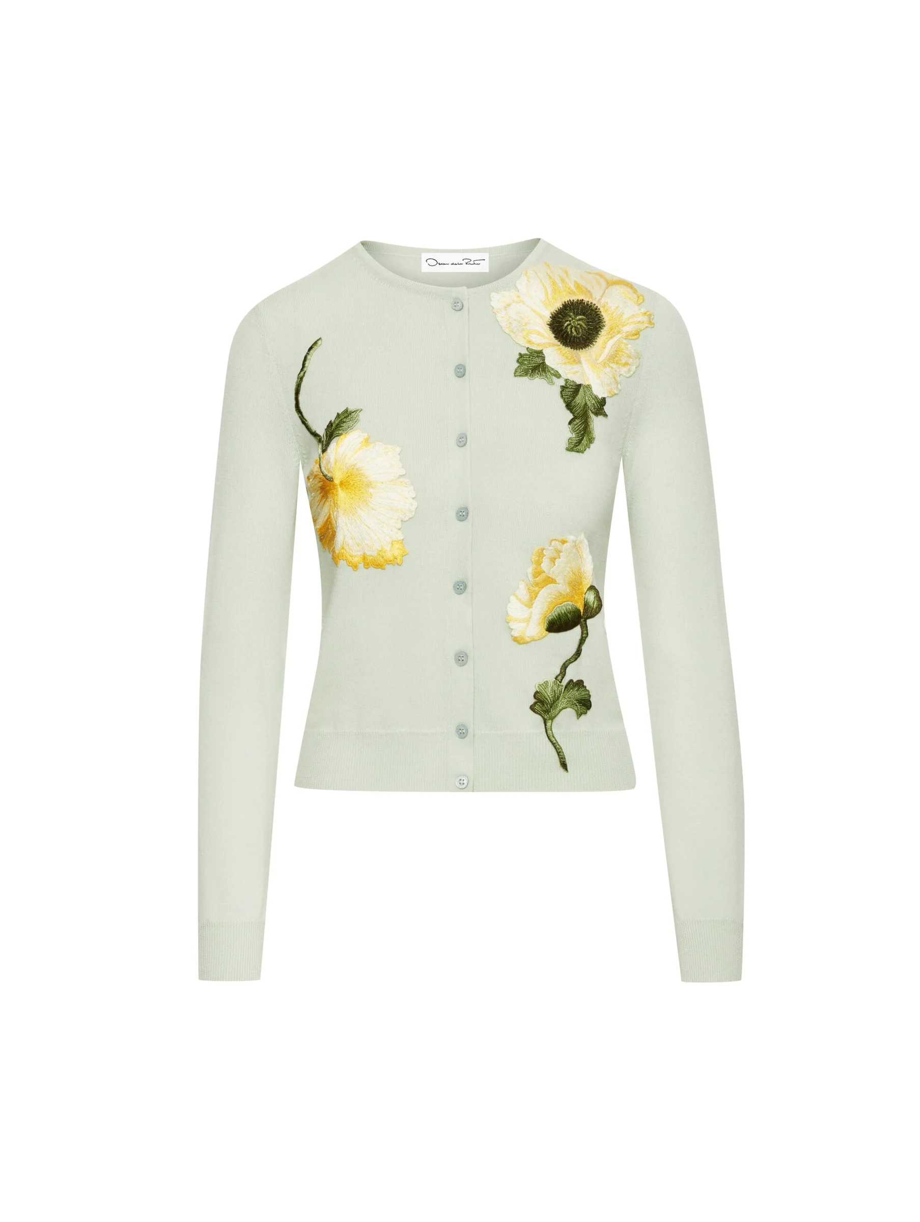Mint green knit cardigan with embroidered yellow poppies and grey buttons on a white background, for Oscar de la Renta.