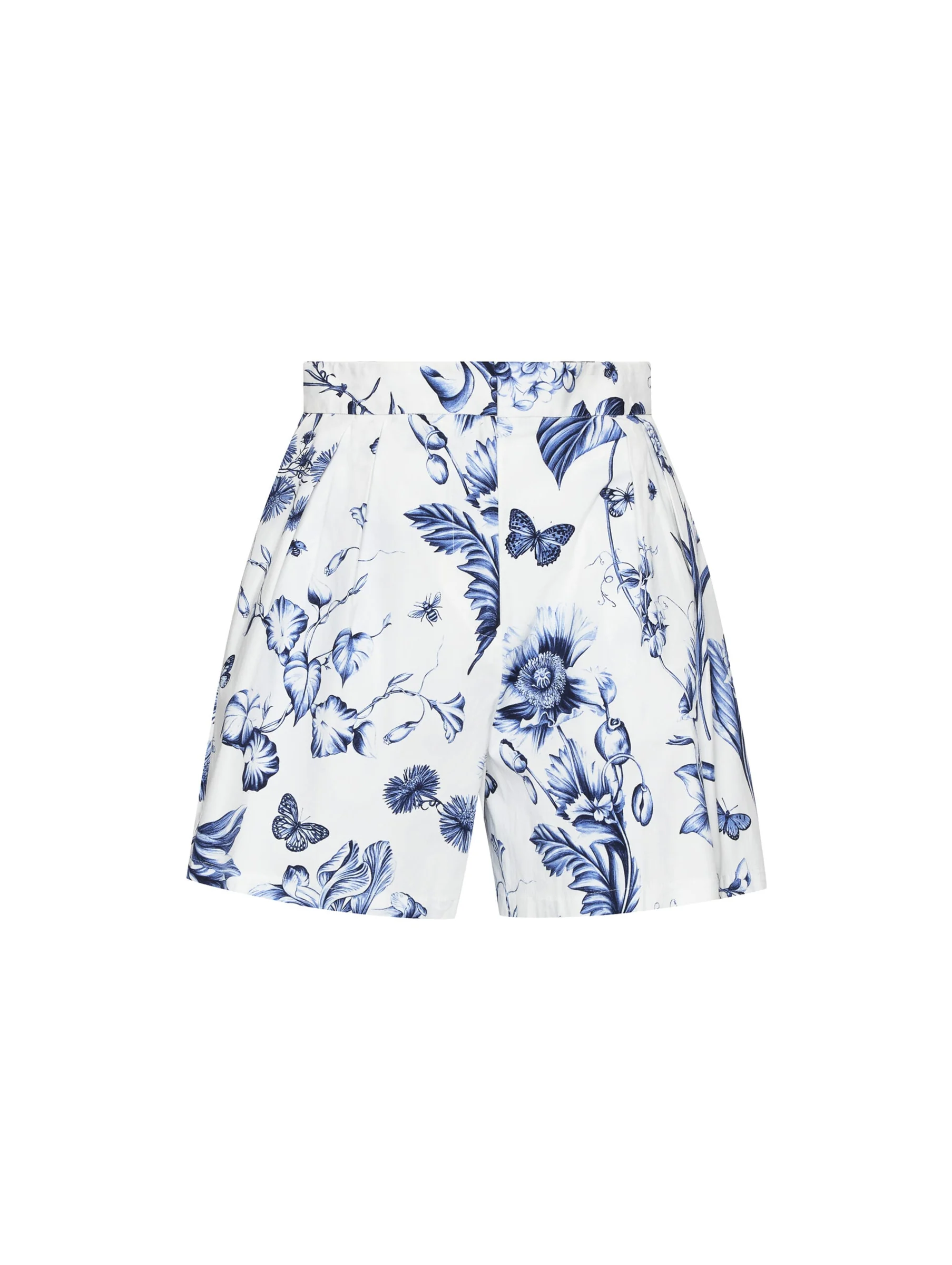 White pleated shorts with blue botanical and butterfly print on a white background, for Oscar de la Renta.